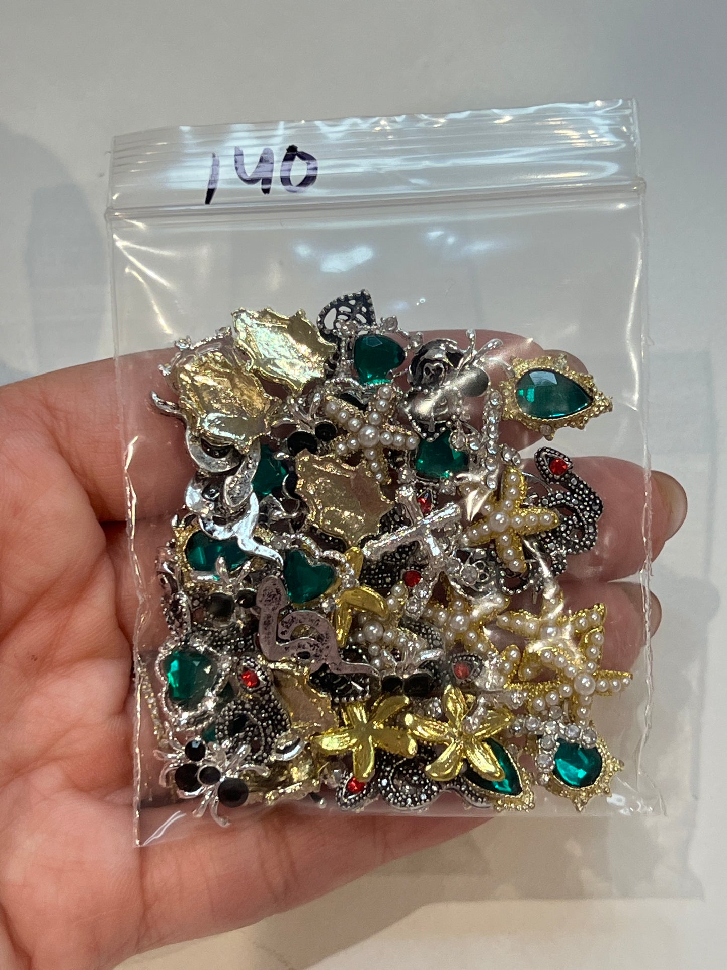 140 metal charms
