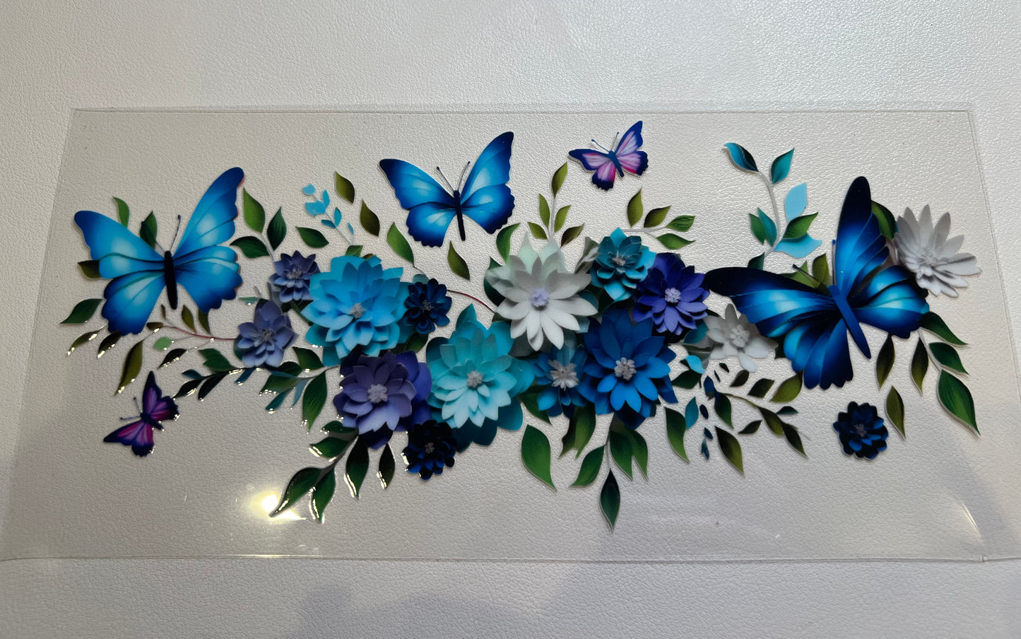 Blue flowers and butterfly